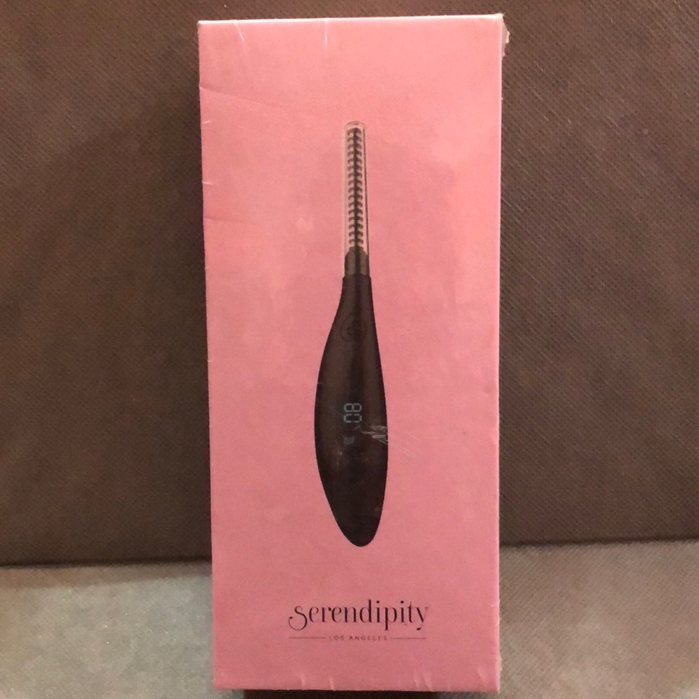 Heated eye lash curler